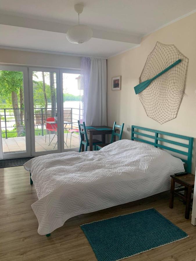 Domki Nad Brzegiem Dluzek Esterno foto
