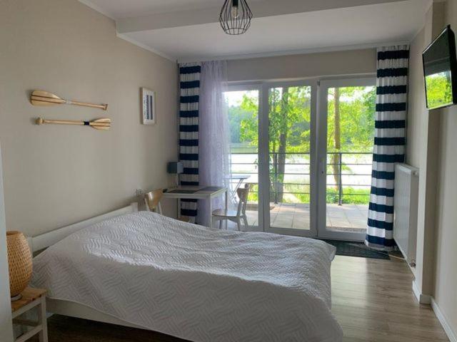Domki Nad Brzegiem Dluzek Esterno foto