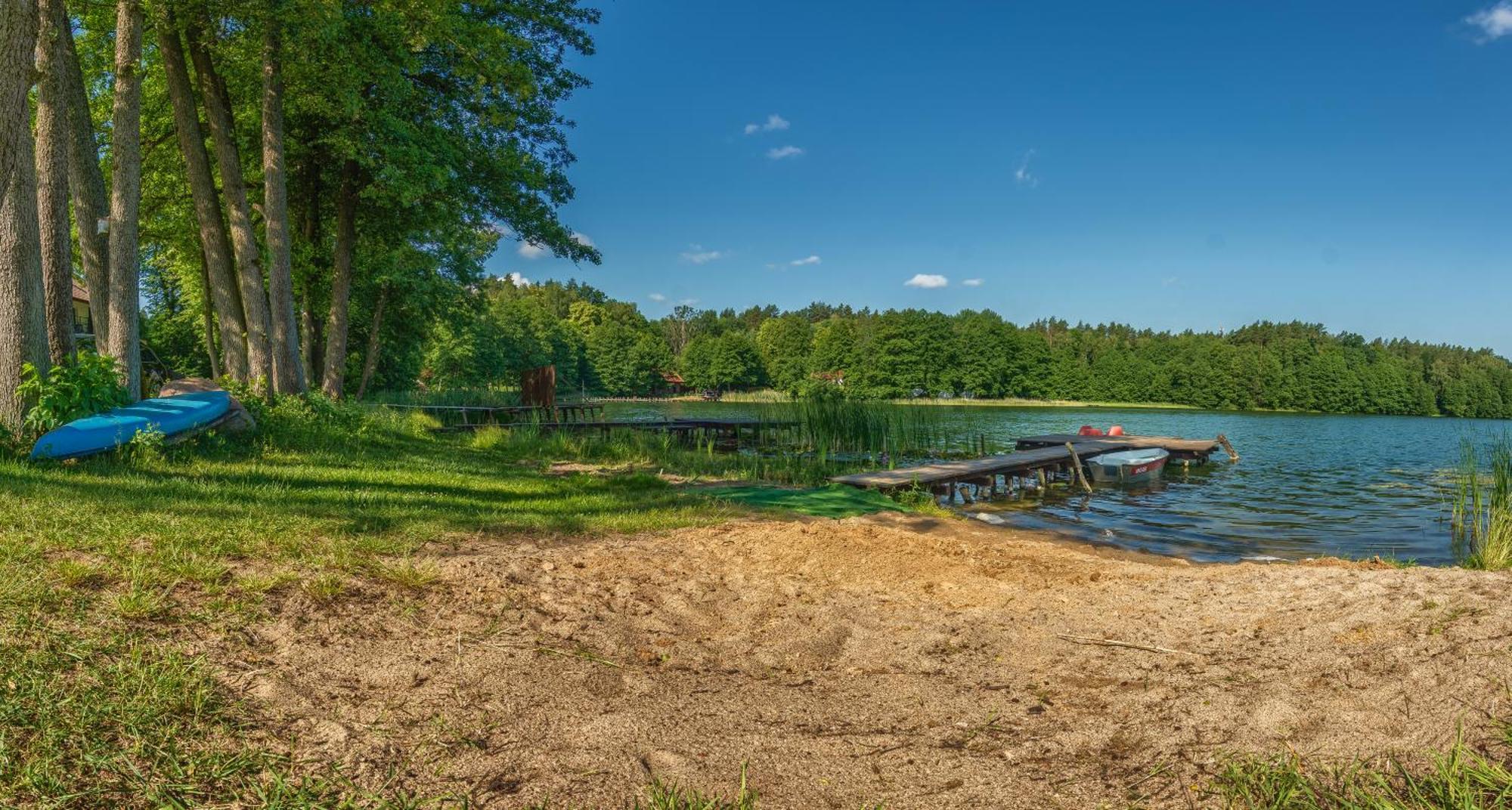 Domki Nad Brzegiem Dluzek Esterno foto
