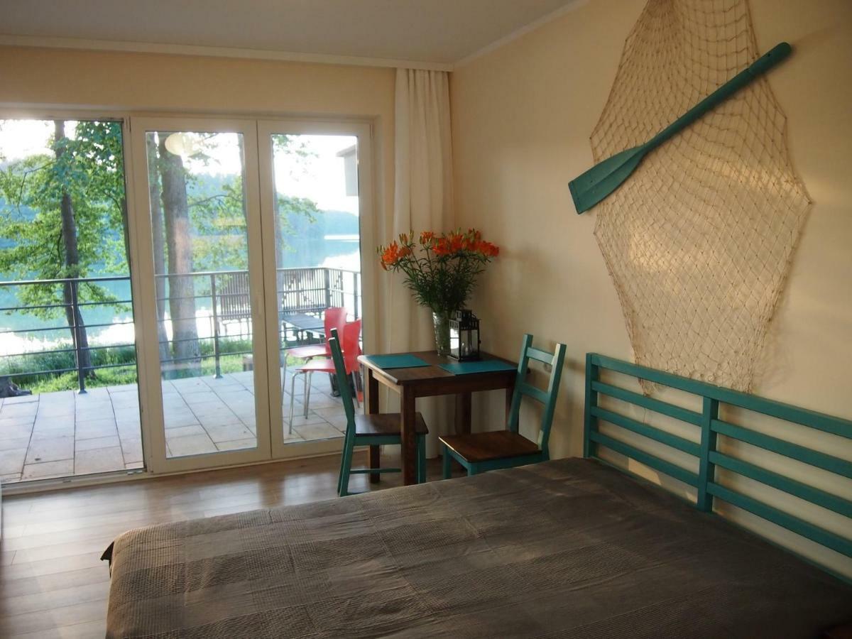 Domki Nad Brzegiem Dluzek Esterno foto