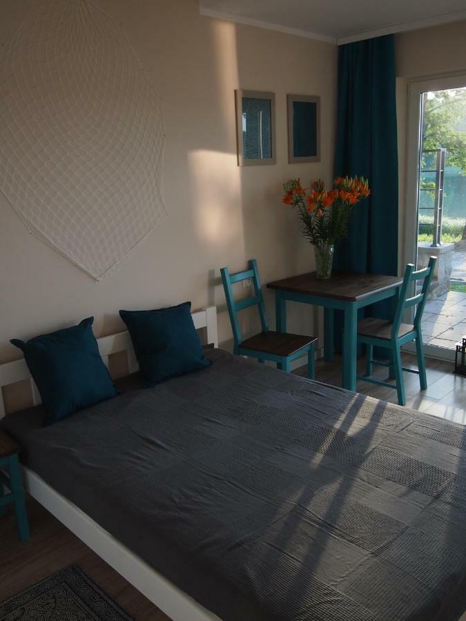Domki Nad Brzegiem Dluzek Esterno foto